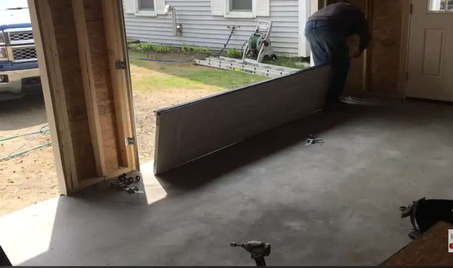 Garage door hardware and track maintenance check in Visalia, CA